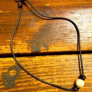 Pearls and leather necklace.